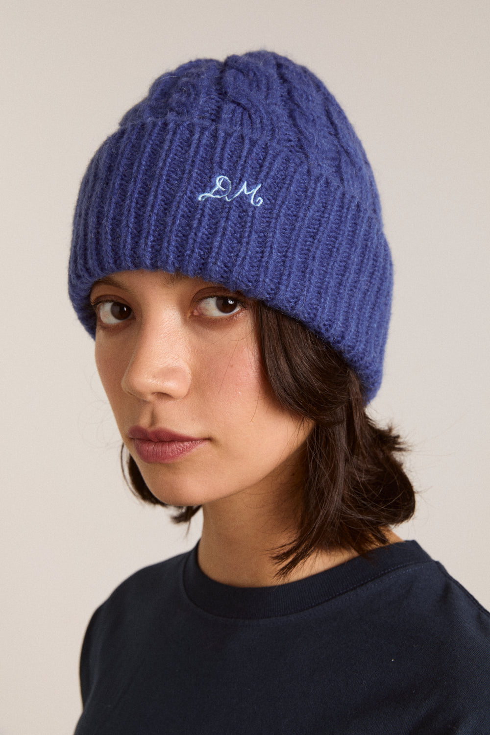 Damson Madder Cable knit beanie in Cobalt