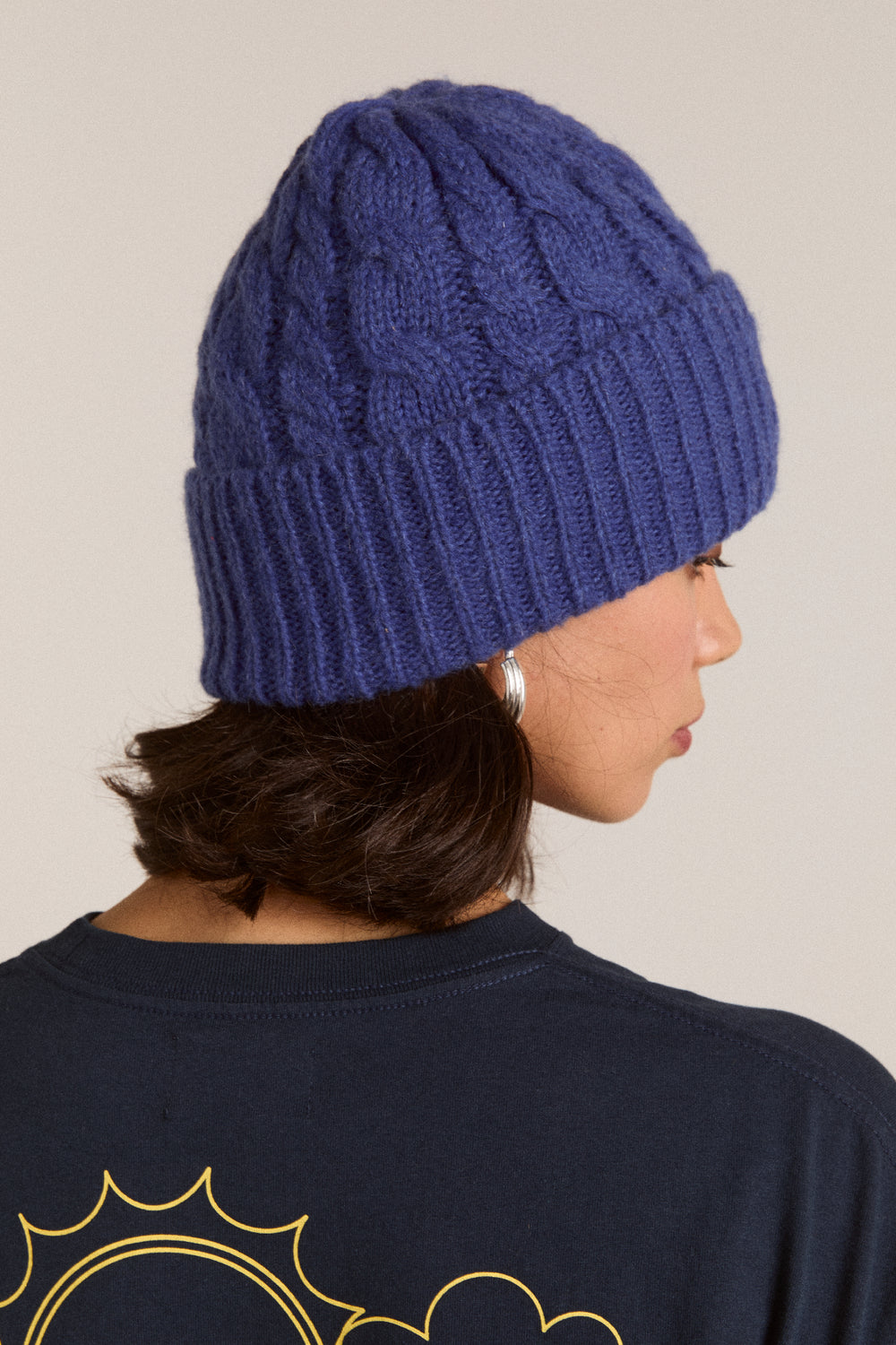 Damson Madder Cable knit beanie in Cobalt